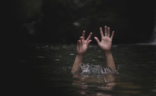 Image from: Boy rescued unconscious from river in Melaka