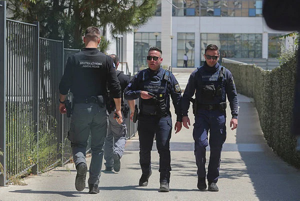 Image from: Athens police hunt for octogenarian over pension shootings
