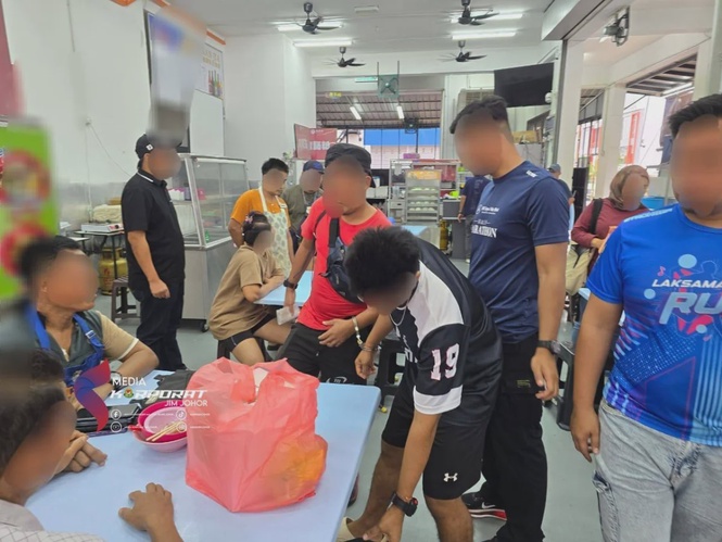 Image from: Johor Immigration Dept nabs 27 foreigners in food premises raid