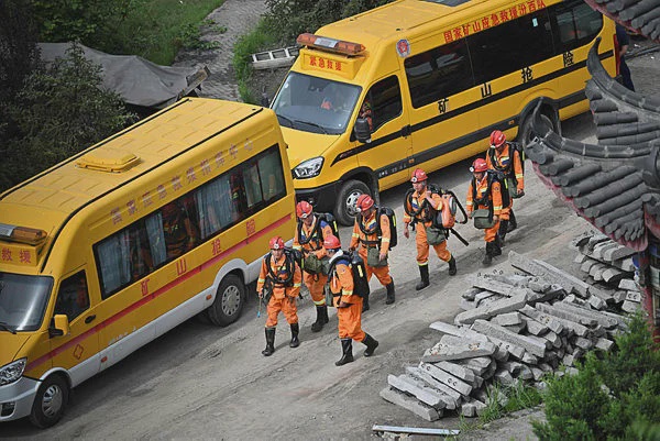Image from: China rescuers search for missing after mine blast kills 82