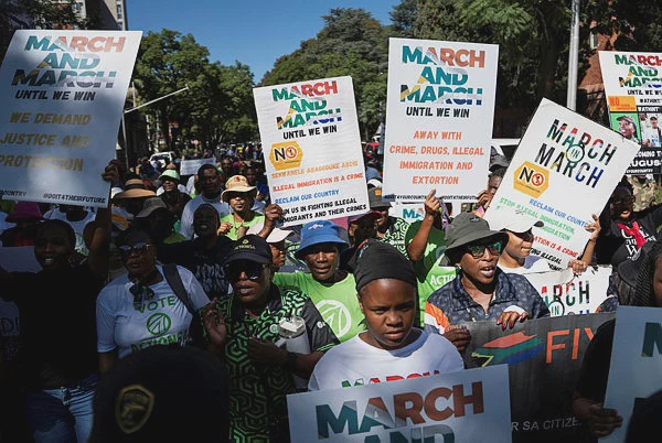 Image from: Foreigners seek safety as South Africa anti-migrant marches grow