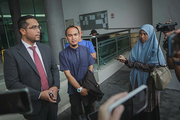 Image from: Son of ex-Perlis MB acquitted of false claim charge