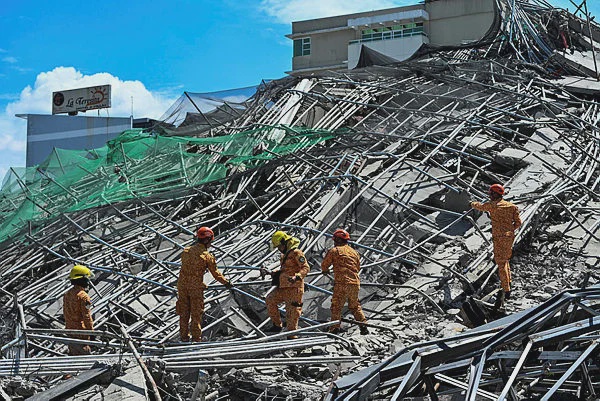 Image from: Malaysian citizen dies in Philippine building collapse
