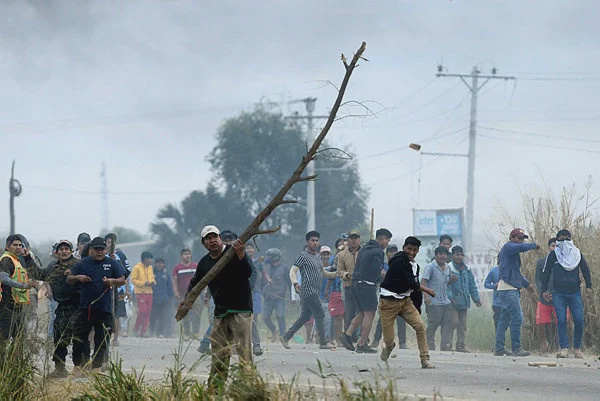 Image from: Police, protesters clash in Bolivia at road blockade