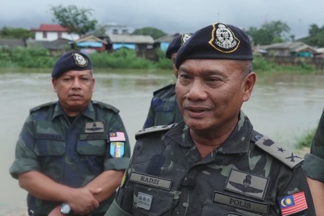 Image from: GOF arrests three men, seizes 600 rubber logs in Kelantan