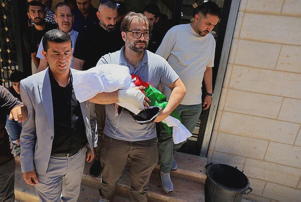 Image from: Seven-month-old Palestinian killed by Israeli military laid to rest