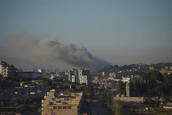 Image from: Israel hits Lebanon village after warning six areas of strikes
