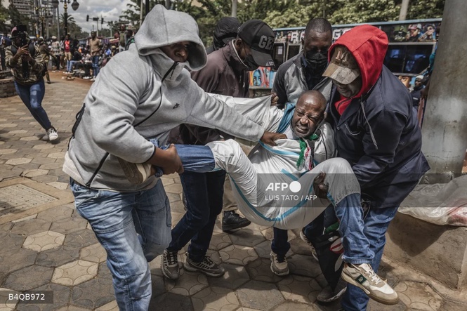 Image from: Kenyans arrested in anti-Ebola centre protest