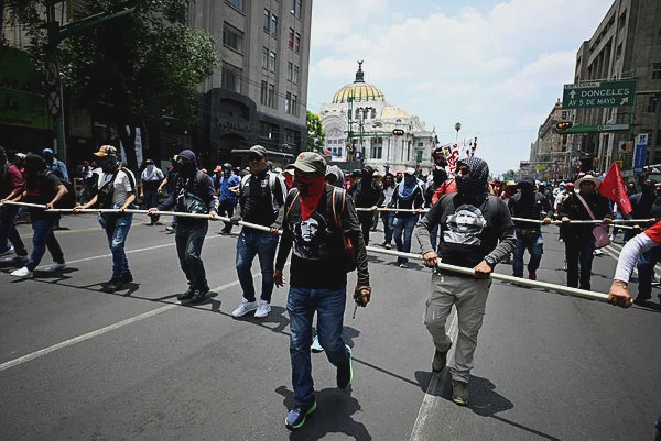Image from: Mexican police tear-gas teachers’ protest 10 days before World Cup