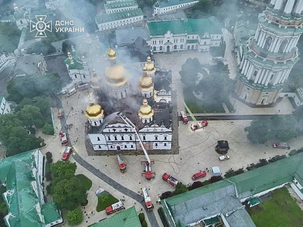 Image from: Russian strikes kill 11, set Kyiv monastery ablaze