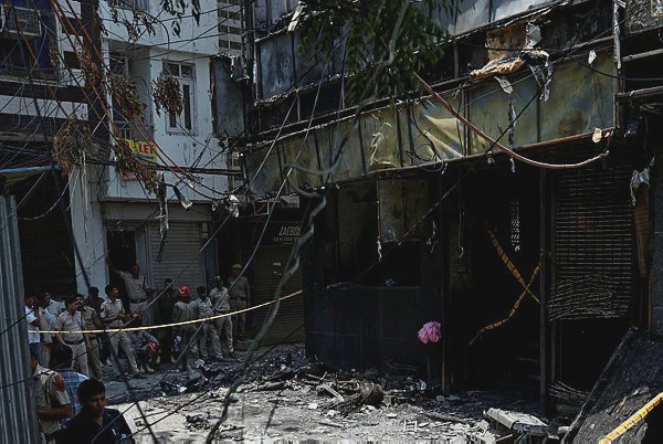 Image from: Hotel owner arrested after deadly New Delhi fire kills 21