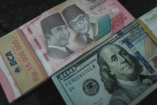 Image from: Rupiah falls to record low past 18,000 against US dollar