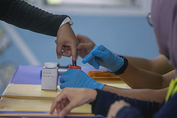 Image from: Home ministry considers special lane for Johor voters