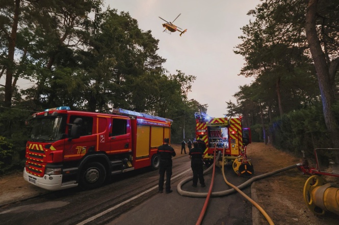 Image from: Wildfires advance near Paris as France marks national day