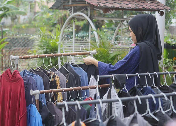 Image from: Malaysians spend over five hours daily on unpaid chores and care