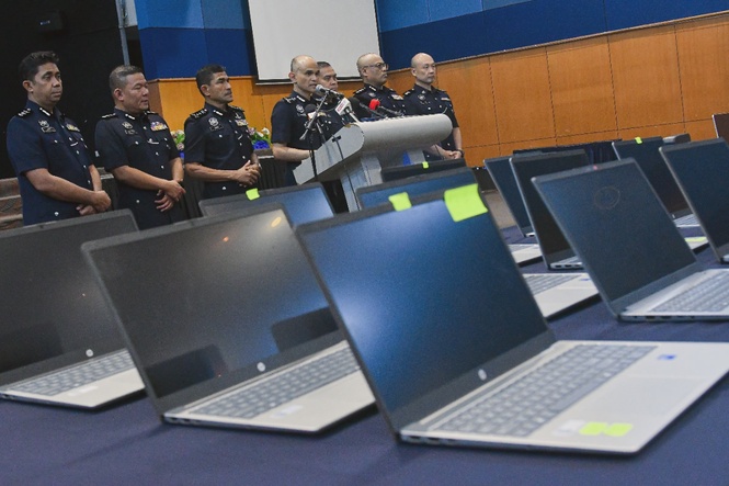 Image from: 40 foreigners held in Kajang, Serdang scam call centre raids