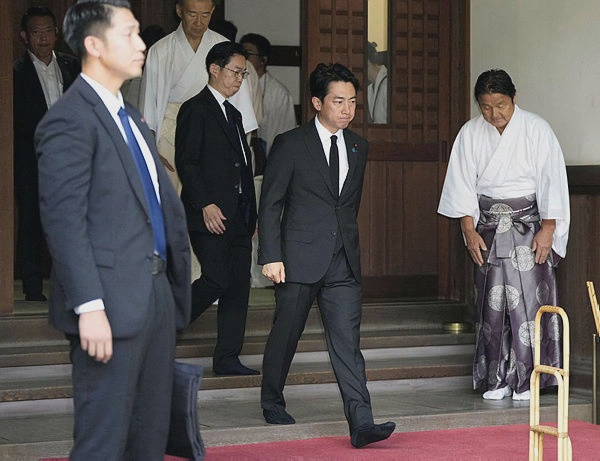 Image from: Japan defence chief visits war shrine as PM stays away