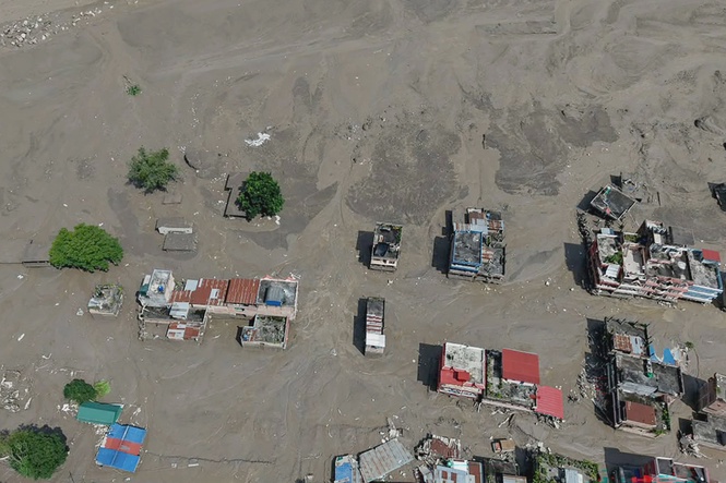 Image from: Nepal floods at China border kill 8, cause ‘major casualties’ in Tibet
