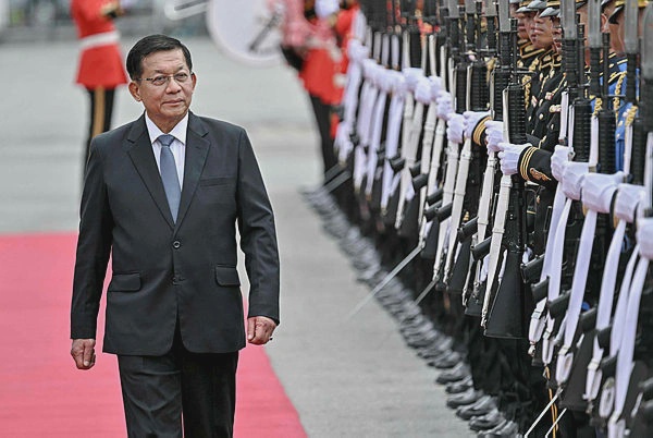 Image from: Myanmar ex-junta chief on first Thailand trip as civilian leader