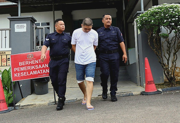 Image from: Used car dealer claims trial to illegal firearm possession charge