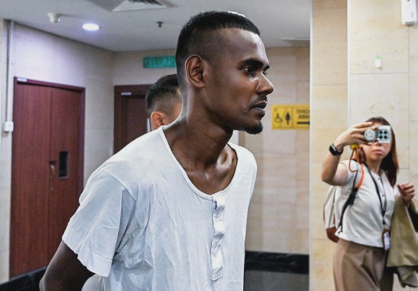 Image from: Car wash worker pleads not guilty to attempted murder of traffic policeman