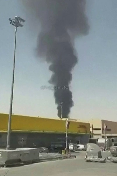 Image from: Black smoke, flames rising near Riyadh airport: residents to AFP