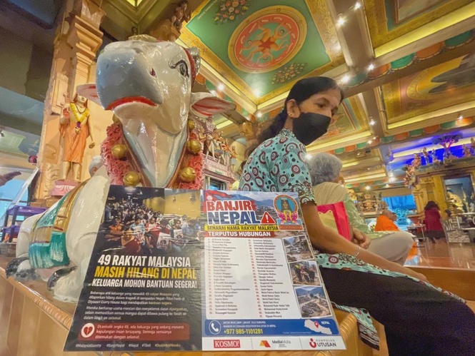 Image from: Malaysian Hindus pray for safe return of those missing in Nepal floods