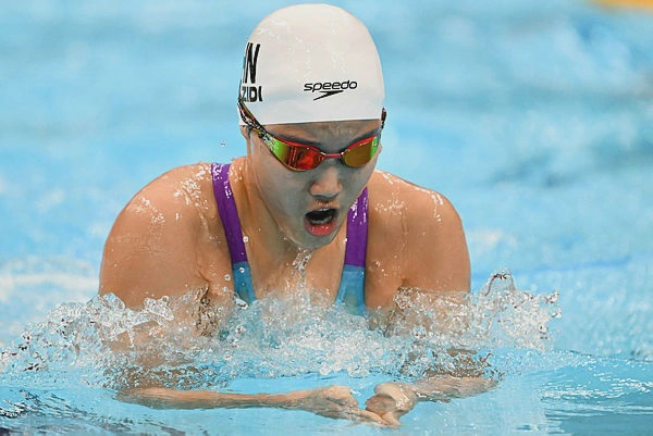Image from: Schoolgirl Yu scorches to second gold as doping case rocks Games