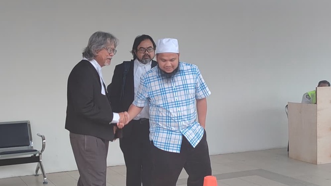After five years, Ebit Lew ordered to enter defence over 11 charges