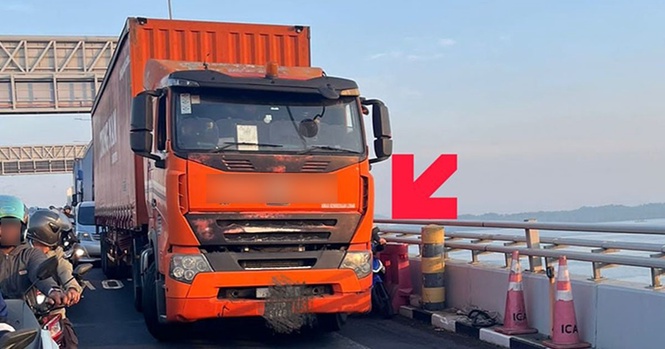 Motorcyclist squeezed between trailer and barrier sparks safety concerns
