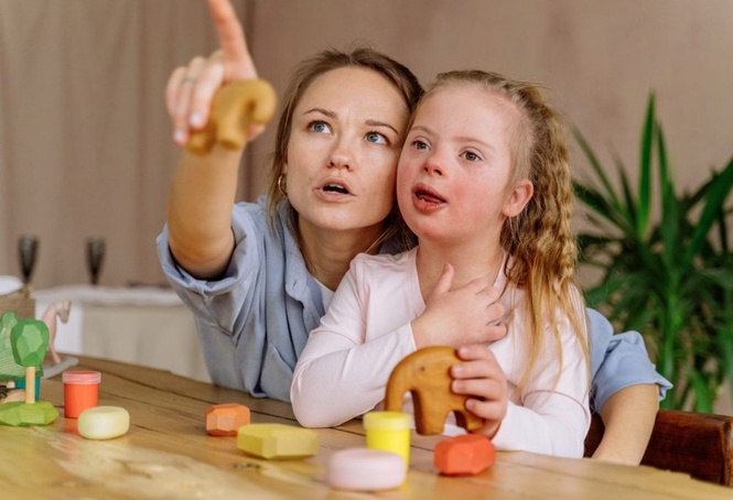 Down Syndrome Child With Mom