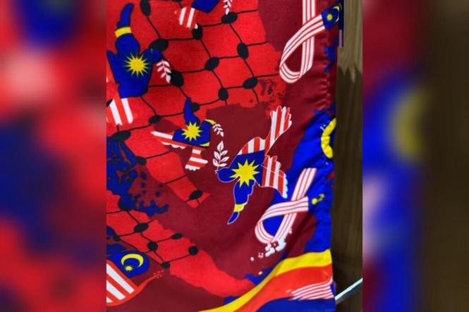 Image from: Polis siasat tudung corak Jalur Gemilang tidak lengkap