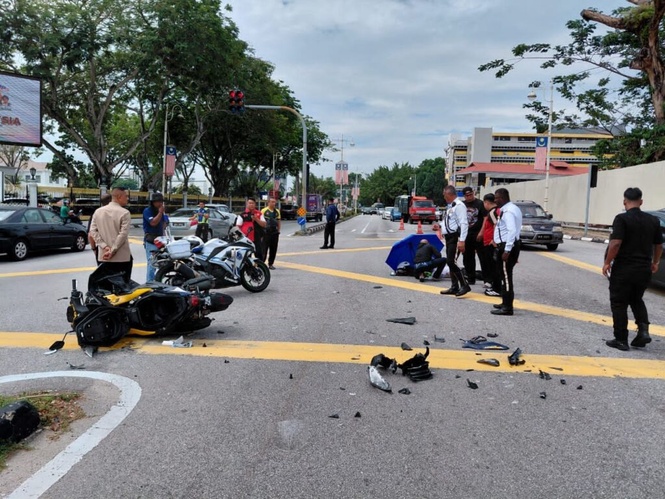Image from: Anggota polis trafik patah tangan, kaki dirempuh lelaki lari sekatan di Ipoh