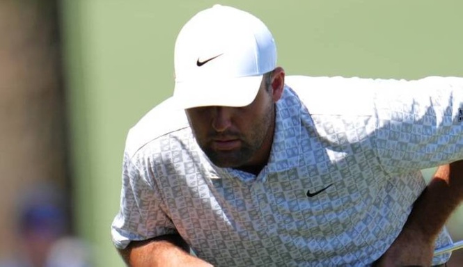 Frustrated Scheffler finds water hazards at Masters
