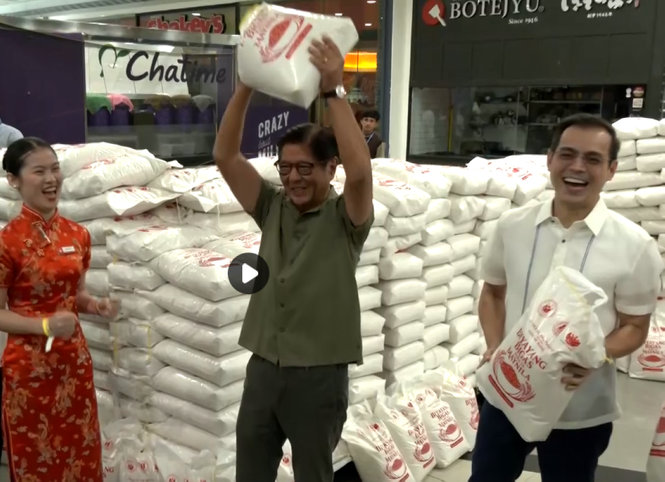 Who's sick? Marcos 'lifts' sacks of rice to dispel health rumors anew