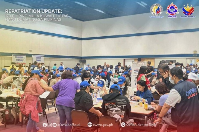 170 Pinoy workers home from Kuwait