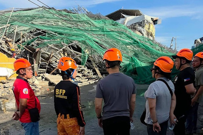 Rescuers search for 20 missing after Philippine building collapse