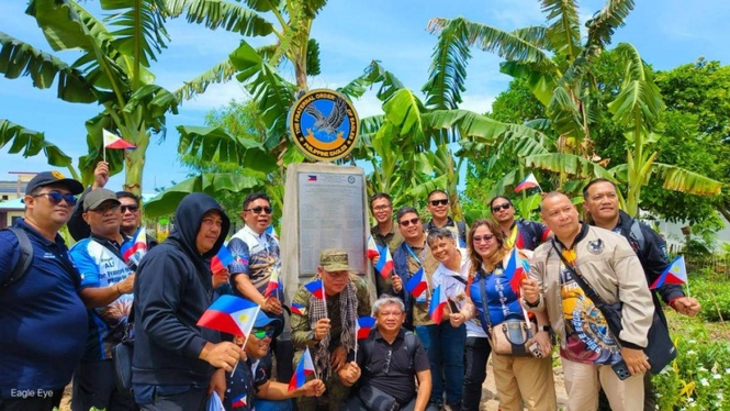 Civic group installs first civilian marker on Pag-asa Island, donates P1.2M in aid