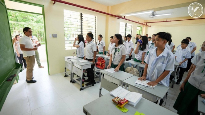 Marcos inspects fire-hit school