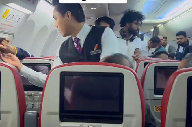 Image from: KL-Kochi flight panic: Batik Air passenger attempts to open emergency exit mid-air