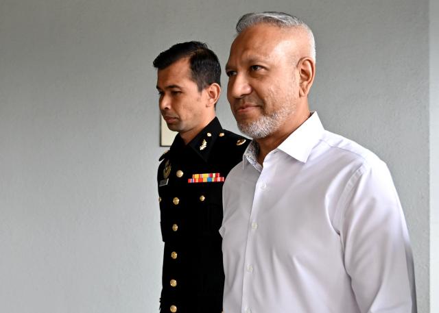 Image from: Ex-FIC CEO charged in RM691m Felda land valuation deception