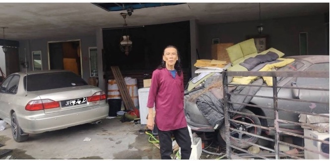 Image from: Baiki sendiri rumah rosak banjir, Yantzen anggap kediaman amanah untuk anak – 'Saya tak pernah putus asa'