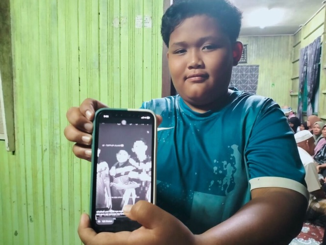 Image from: Maut dipanah petir: Bapa sempat pangku anak